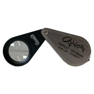 10X20 triplet loupe with UV light   white rim of light