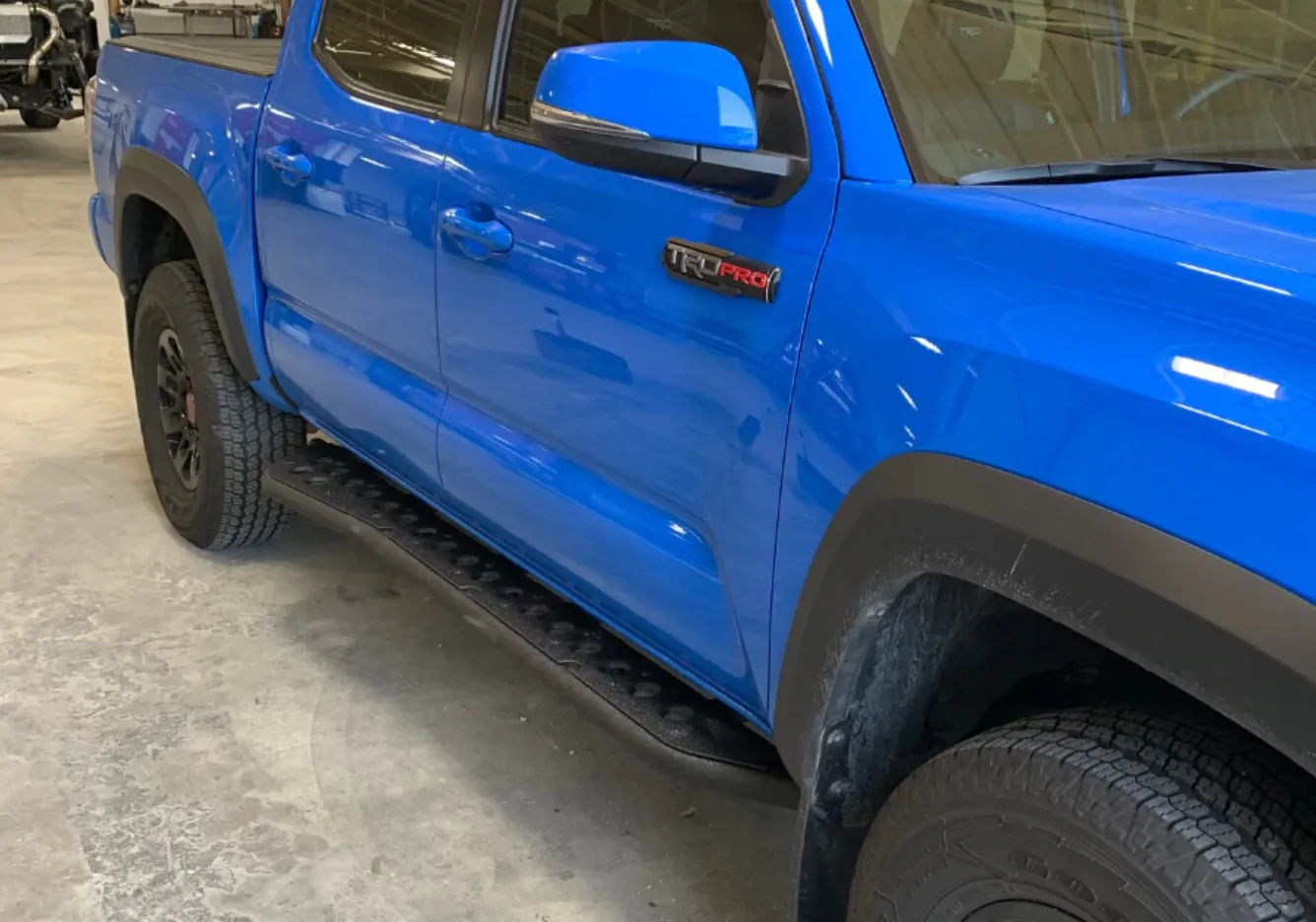2005-2023 TOYOTA TACOMA STEP EDITION ROCK SLIDERS BY CALI RAISED LED