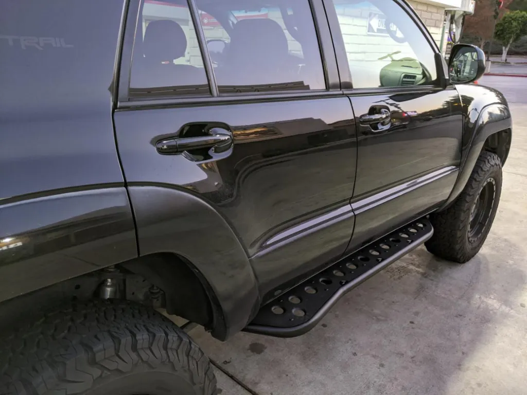 2010-2023 TOYOTA 4RUNNER STEP EDITION BOLT ON ROCK SLIDERS BY CALI RAISED LED