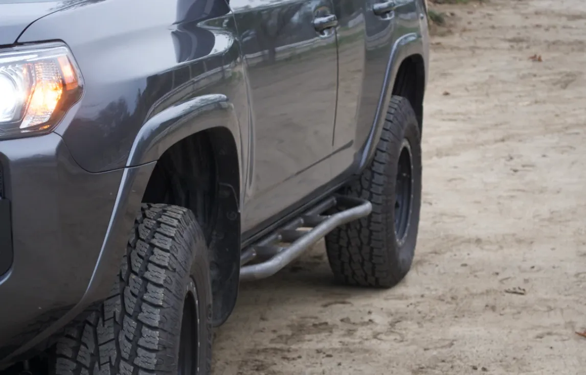 2010-2023 TOYOTA 4RUNNER STEP EDITION BOLT ON ROCK SLIDERS BY CALI RAISED LED