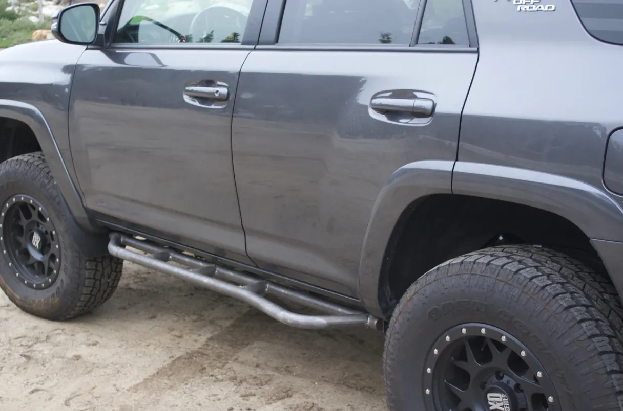 2010-2023 TOYOTA 4RUNNER STEP EDITION BOLT ON ROCK SLIDERS BY CALI RAISED LED